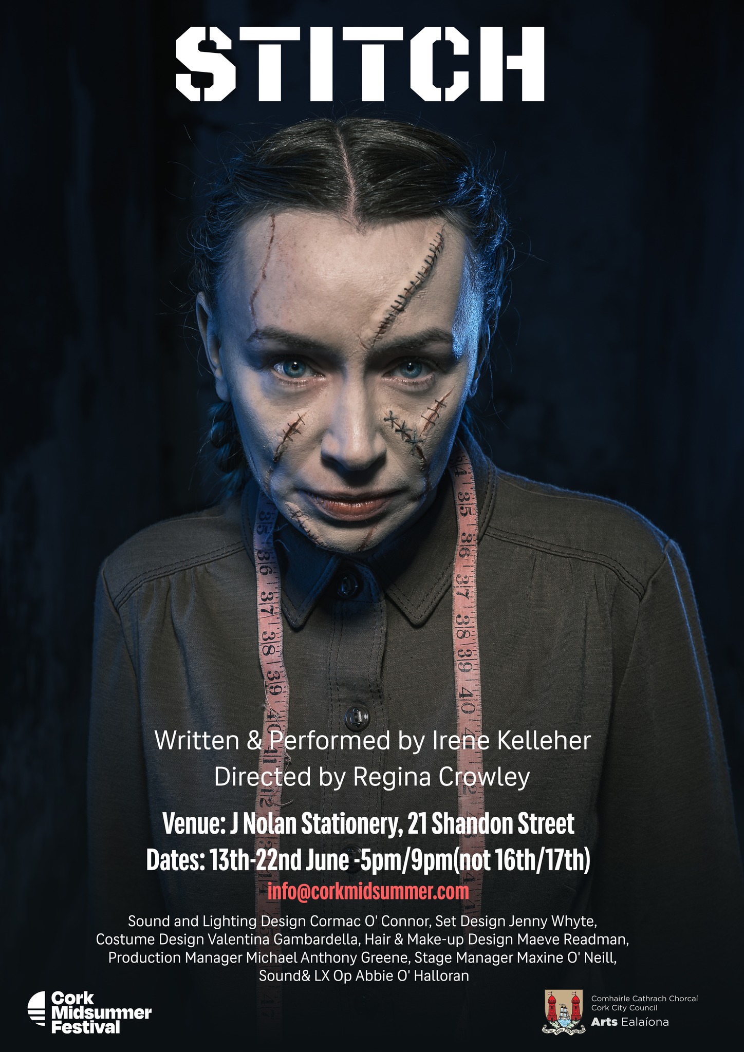A promotional poster for the theatre production "STITCH," featuring a central portrait photograph by leading Cork-based theatre photographer Marcin Lewandowski. The portrait shows actress Irene Kelleher from the chest up, looking directly at the viewer with a stern expression. Her dark hair is pulled back into two braids, and her face is adorned with theatrical makeup designed to resemble prominent scars and stitches, particularly across her forehead and her right cheek and nose. She wears a dark, long-sleeved collared shirt and a light pink measuring tape is draped around her neck. Above the portrait, in large, bold, white distressed lettering, is the title "STITCH." Below the portrait, white text provides details about the production: "Written & Performed by Irene Kelleher," "Directed by Regina Crowley," "Venue: J Nolan Stationery, 21 Shandon Street," and "Dates: 13th-22nd June - 5pm/9pm (not 16th/17th)." Contact information, "info@corkmidsummer.com," is also included. Further down, credits for Sound and Lighting Design, Set Design, Costume Design, Hair & Make-up Design, Production Manager, Stage Manager, and Sound & LX Op are listed. At the bottom left, the logo for "Cork Midsummer Festival" is present, and at the bottom right, an emblem for "Comhairle Cathrach Chorcaí Cork City Council" and "Arts Ealaíona" is visible. The overall background of the poster is dark.